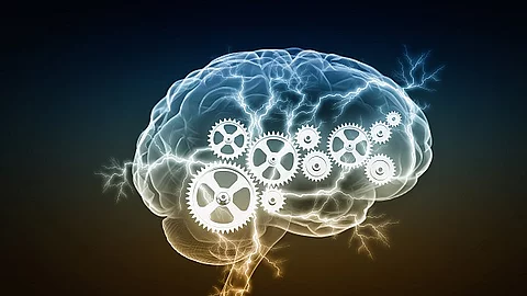 Symbolbild: Mechanismen im menschlichen Gehirn; Illustration eines Gehirns mit Zahnrädern