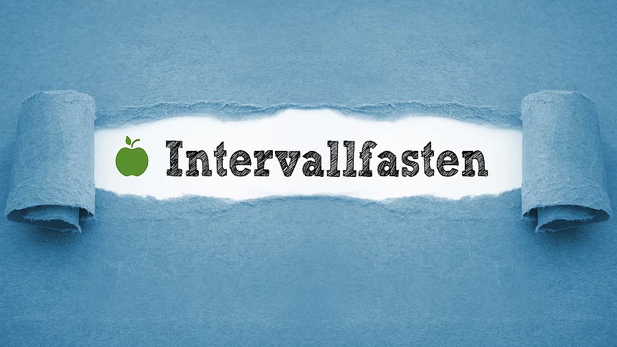 Schriftzug "Intervallfasten" auf blauem Hintergrund Schriftzug "Intervallfasten" auf blauem Hintergrund
