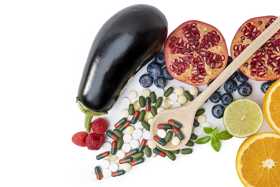 Obst, Gemüse und bunte Pillen