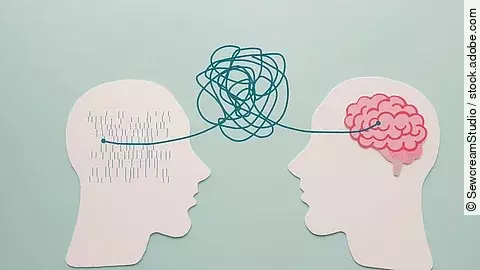 Illustration: 2 ausgeschnittene Papierköpfe verbunden durch ein Knäuel