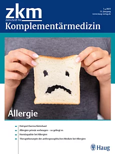 Coverabbildung zkm 1/2023: Toastbrotscheibe mit traurigem Smiley