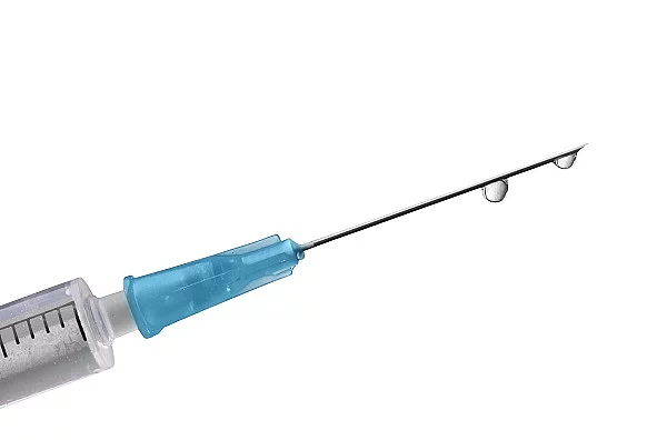 Close-up of Medical syringe isolated on white Spritze