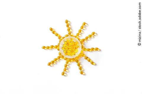 Sonne gelegt aus Vitamin-D-Kapseln