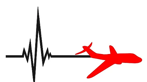 Symbolbild Herznotfall, EKG-Kurve und Flugzeug