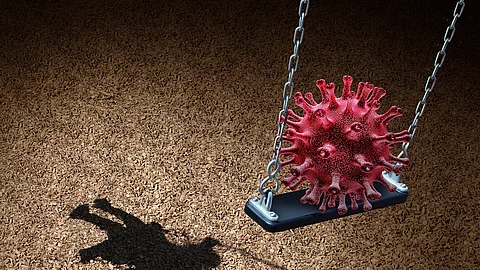 Illustration: Coronavirus auf einer Schaukel