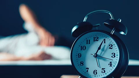 Sleeping disorder or insomnia Wecker, Bett