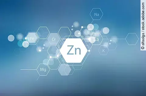 Abkürzung für Zink "Zn" in Grafik mit blauem Hintergrund.