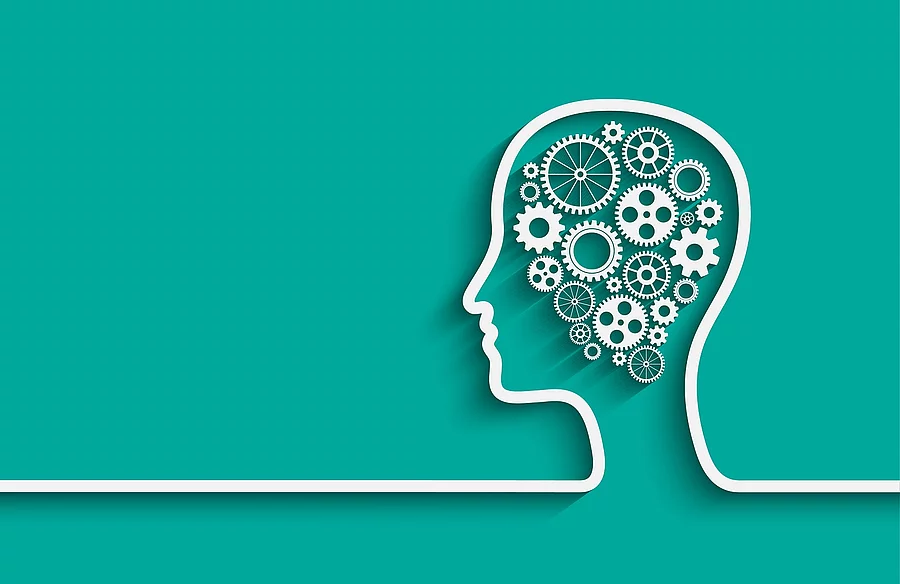 Illustration: Kopf mit Zahnrädern, Denkprozess, Kognition
