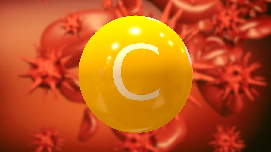 Illustration: gelbes Vitamin-C-Molekül im Blutstrom Illustration: gelbes Vitamin-C-Molekül im Blutstrom