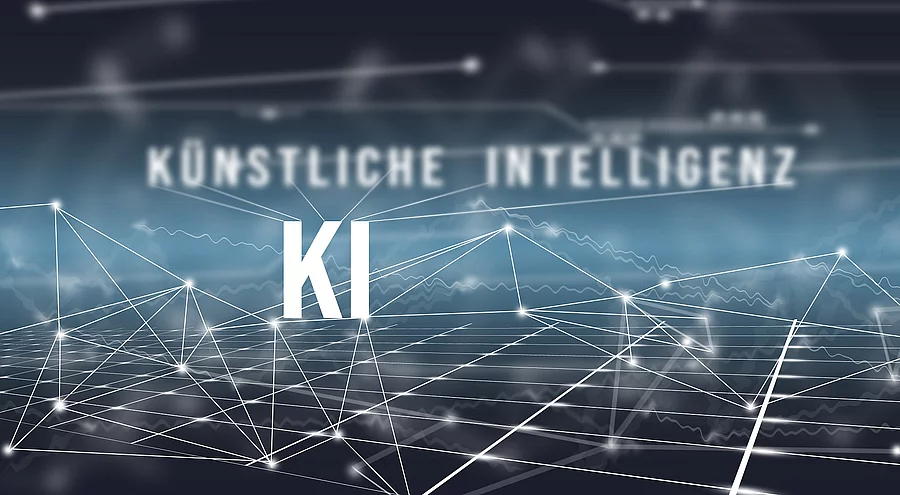 KI - KÜNSTLICHE INTELLIGENZ Symbolbild Künstliche Intelligenz, Vernetzung auf blauem Grund